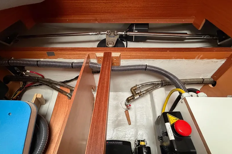 Slide: The Image of Interior view of 2021 Hallberg-Rassy 40C yacht showing mechanical and electrical components. - 40