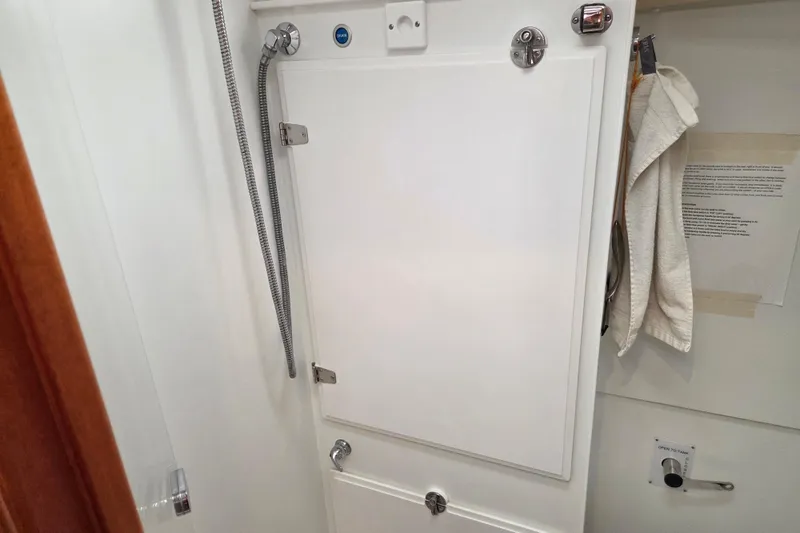 Slide: The Image of Bathroom interior of 2021 Hallberg-Rassy 40C yacht with shower and towel. - 45