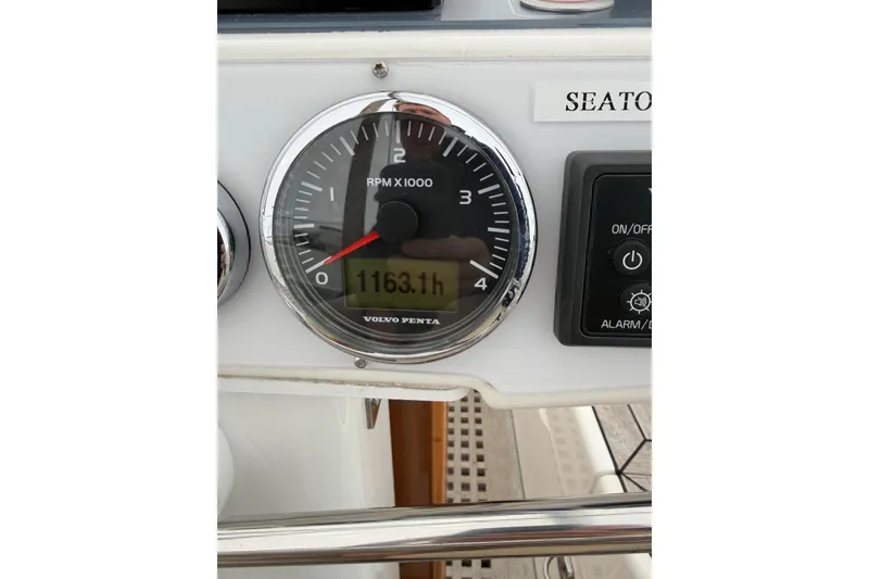 Slide: The Image of Close-up of a 2021 Hallberg-Rassy 40C boat tachometer showing 1163.1 hours. - 55