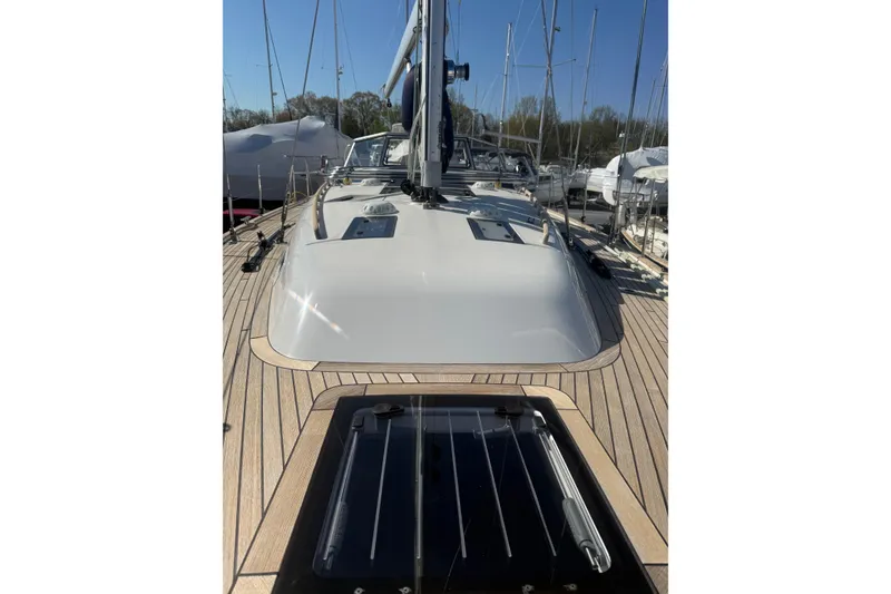 Slide: The Image of 2021 Hallberg-Rassy 40C sailboat on stands, showcasing hull and keel design. - 60