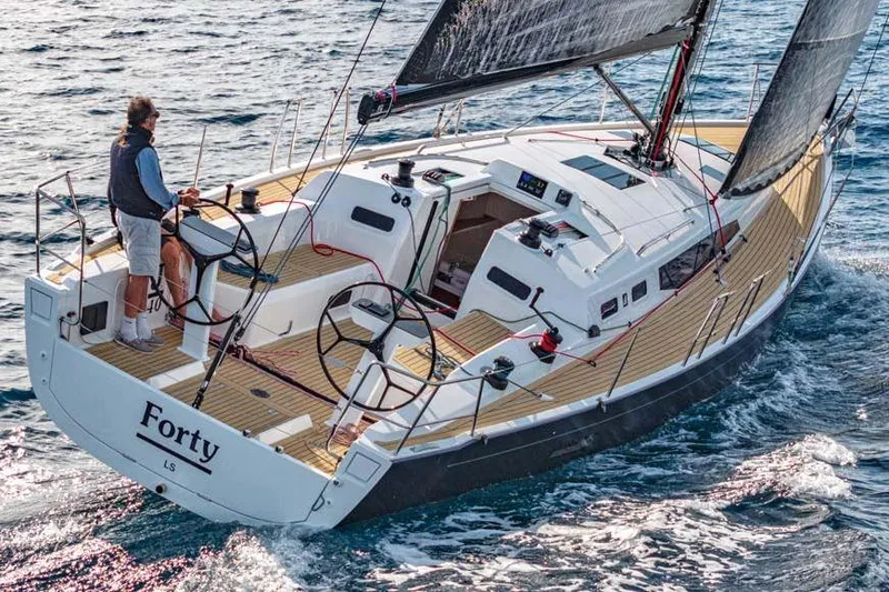 Slide: The Image of 2026 J Boats J/40 sailing on open water, featuring sleek design and modern amenities. - 3