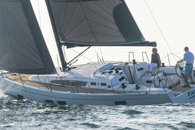 Slide: The Image of 2026 J Boats J/40 sailing yacht on open water, featuring sleek design and modern sails. - 4