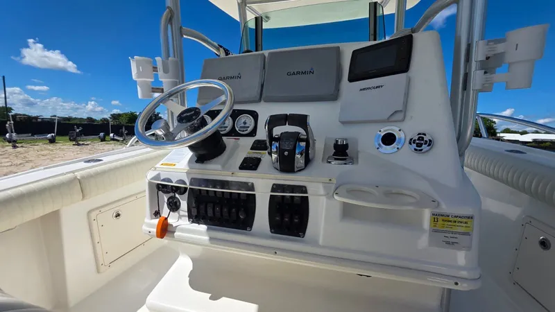 Slide: The Image of Mako 284 Center Console 2020 with Garmin controls. - 14