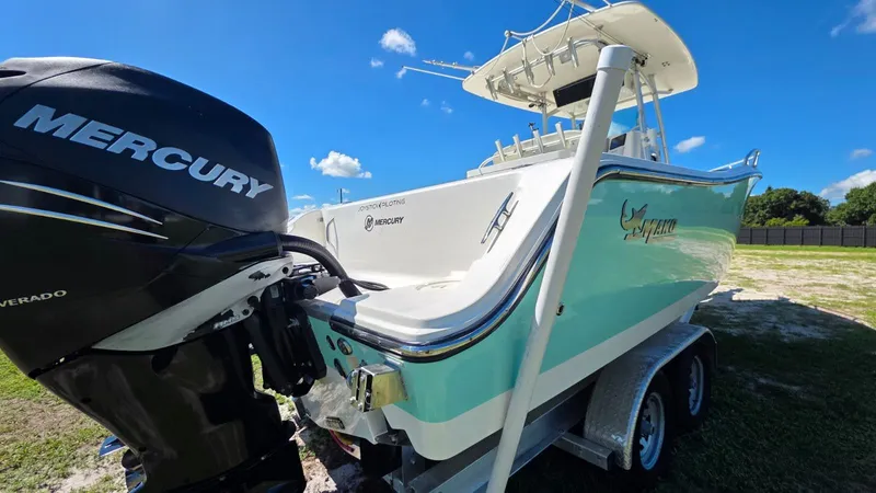 Slide: The Image of Mako 284 Center Console boat with Mercury engine, 2020 model, on trailer. - 3