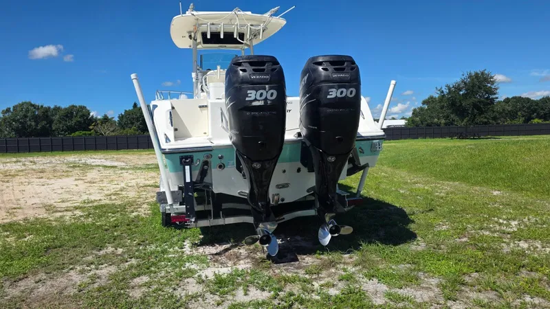 Slide: The Image of Mako 284 Center Console boat with twin outboard engines, year 2020. - 5