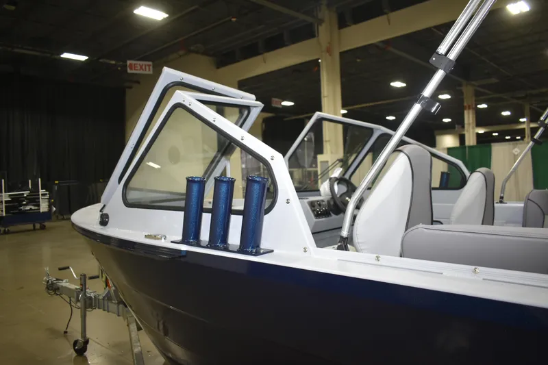 Slide: The Image of Interior of 2026 KingFisher 16 Falcon boat with modern seating and controls. - 8