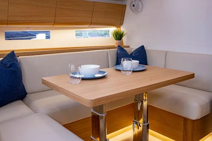 Slide: The Image of Luxurious interior of 2026 J Boats J/45 yacht with elegant dining area and modern decor. - 8