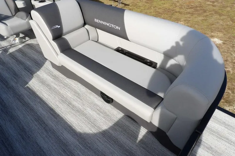 Slide: The Image of 2026 Bennington S 22 SSR boat interior with gray and black seating. - 11