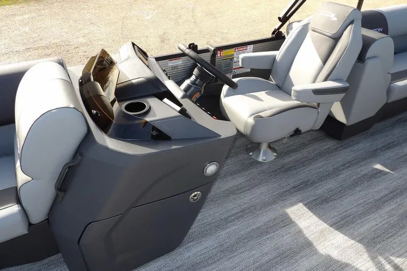 Slide: The Image of 2026 Bennington S 22 SSR boat interior with modern helm and comfortable seating. - 15