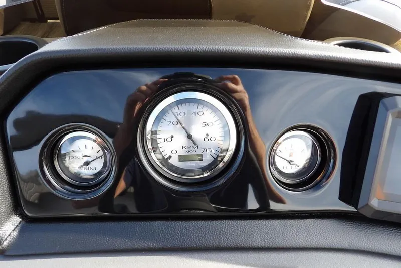 Slide: The Image of Dashboard of 2026 Bennington S 22 SSR with RPM and trim gauges. - 16