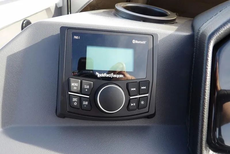 Slide: The Image of 2026 Bennington S 22 SSR audio system with Rockford Fosgate Bluetooth controls. - 17