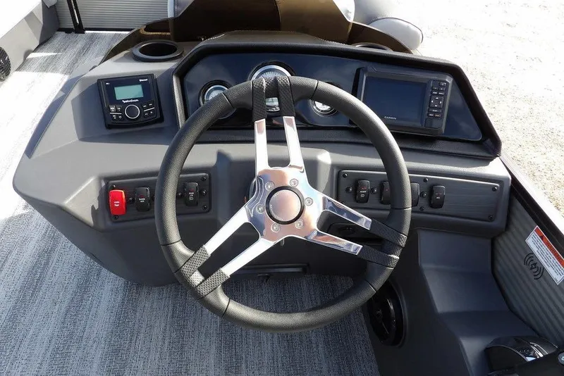 Slide: The Image of Steering console of 2026 Bennington S 22 SSR boat with modern controls and displays. - 19