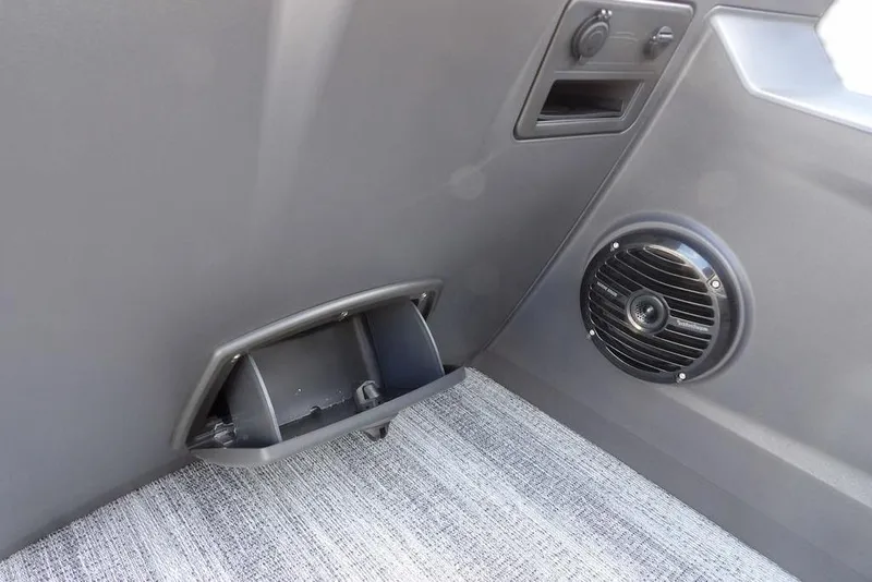 Slide: The Image of Interior of 2026 Bennington S 22 SSR with speaker and storage compartment. - 22