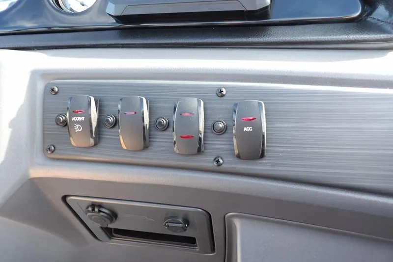 Slide: The Image of Control panel of 2026 Bennington S 22 SSR boat with switches and buttons. - 23