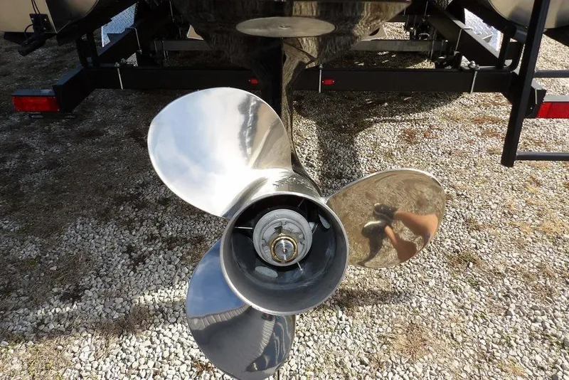 Slide: The Image of Propeller of 2026 Bennington S 22 SSR boat on gravel surface. - 29