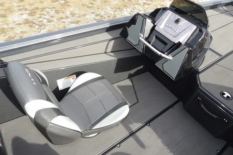 Slide: The Image of 2026 Lund 1975 Renegade boat interior with sleek seating and modern console design. - 18