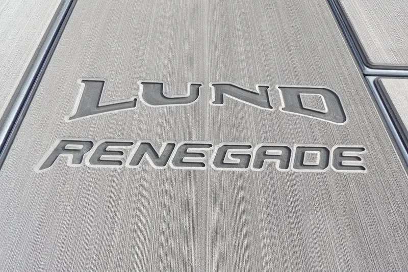 Slide: The Image of Embossed Lund Renegade logo on textured surface, 2026 model. - 22