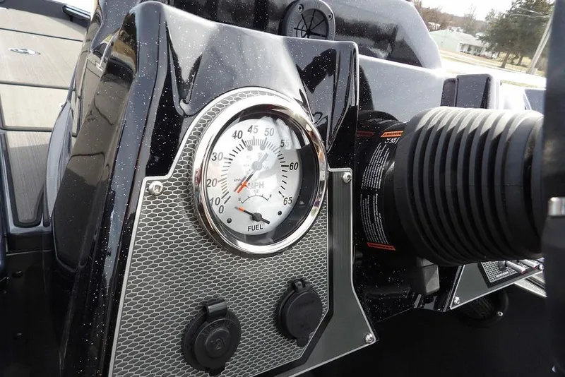 Slide: The Image of Dashboard of 2026 Lund 1975 Renegade boat with speedometer and fuel gauge. - 27