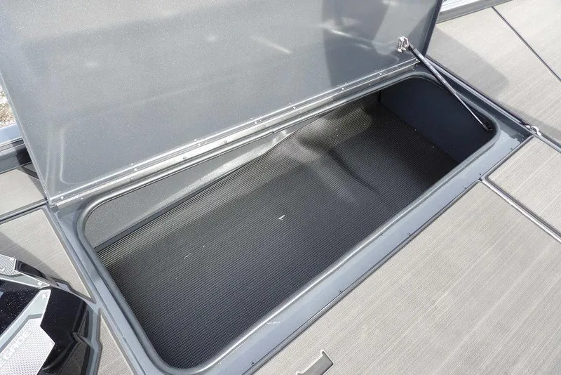 Slide: The Image of Open storage compartment in 2026 Lund 1975 Renegade boat, showcasing spacious interior. - 31