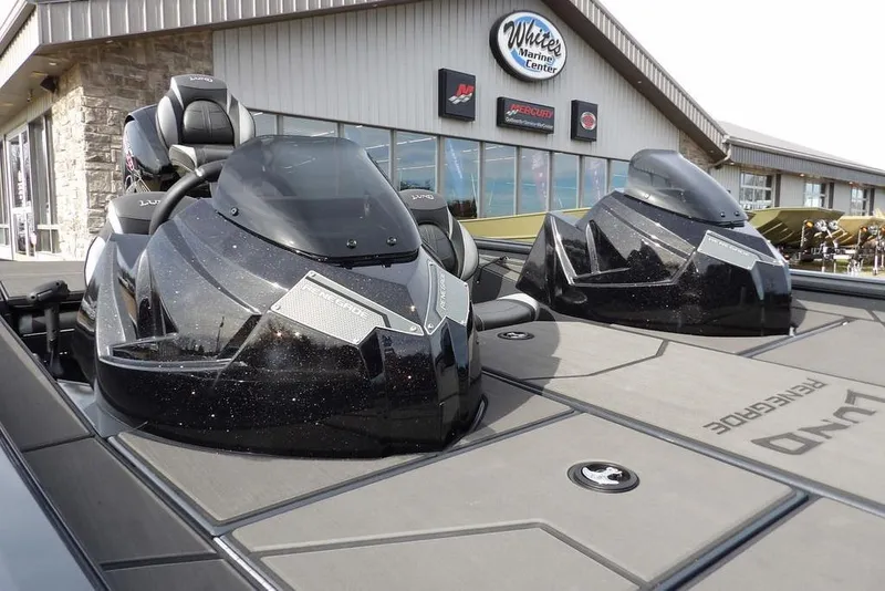 Slide: The Image of 2026 Lund 1975 Renegade boat at White's Marine Center, showcasing sleek design and modern features. - 40