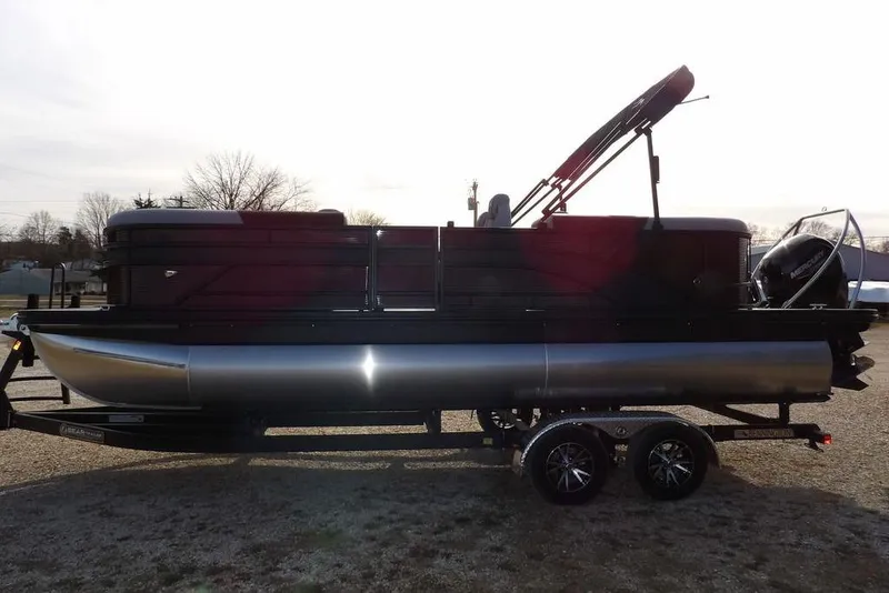 The Image of 2026 Bennington S 22 SSR pontoon boat on trailer, side view. - 1