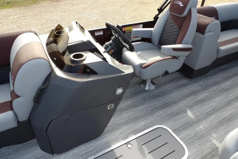 Slide: The Image of Interior of 2026 Bennington S 22 SSR pontoon boat with modern seating and helm. - 15