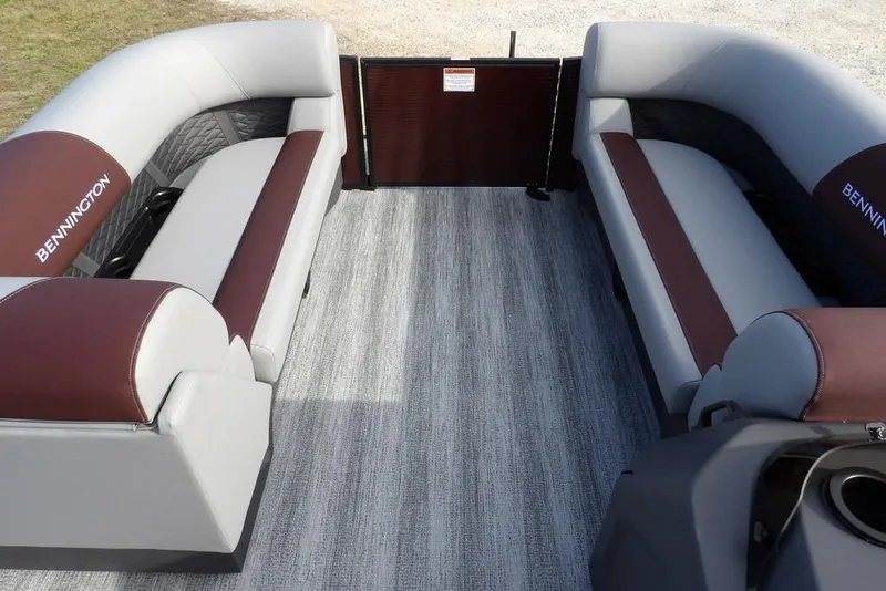 Slide: The Image of 2026 Bennington S 22 SSR pontoon boat interior with gray and brown seating. - 17