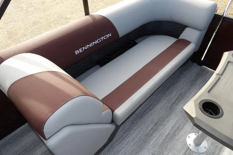 Slide: The Image of 2026 Bennington S 22 SSR boat seating with brown and gray upholstery. - 28