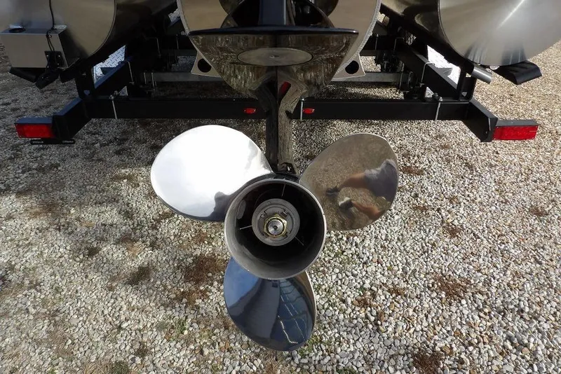 Slide: The Image of Propeller of 2026 Bennington S 22 SSR pontoon boat on gravel surface. - 37