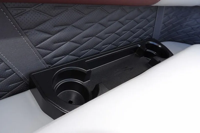 Slide: The Image of 2026 Bennington S 22 SSR interior with cup holders and textured upholstery. - 38