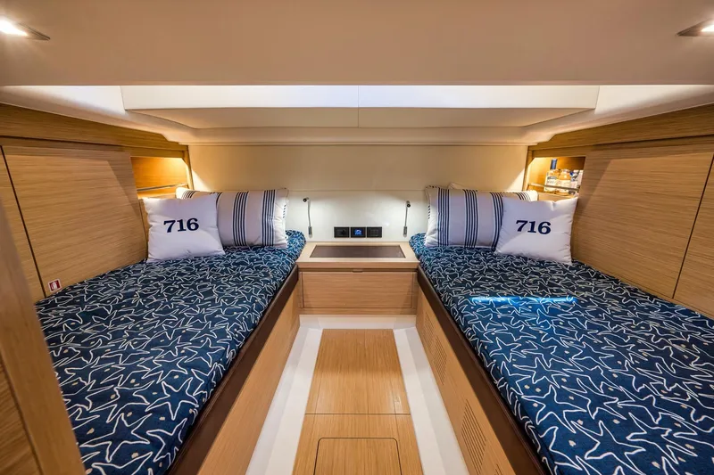 Slide: The Image of Interior cabin of 2023 Pardo Yachts P43 with twin beds and nautical decor. - 20