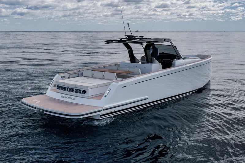 Slide: The Image of 2023 Pardo Yachts P43 cruising on calm ocean waters under a cloudy sky. - 4