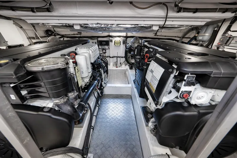 Slide: The Image of Engine room of 2023 Pardo Yachts P43, showcasing dual engines and mechanical components. - 25