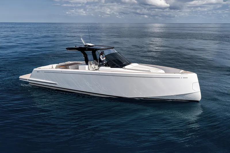 Slide: The Image of 2023 Pardo Yachts P43 cruising on calm ocean waters under a cloudy sky. - 6