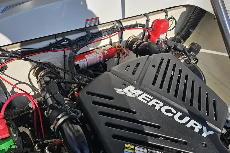 Slide: The Image of Engine compartment of a 2003 Baja 275 Boss with Mercury components. - 101