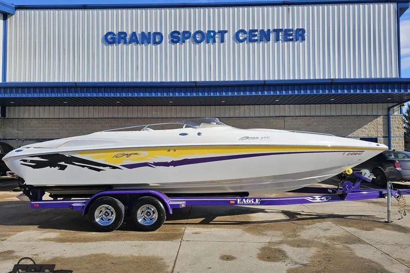 Slide: The Image of 2003 Baja 275 Boss speedboat on trailer at Grand Sport Center. - 4