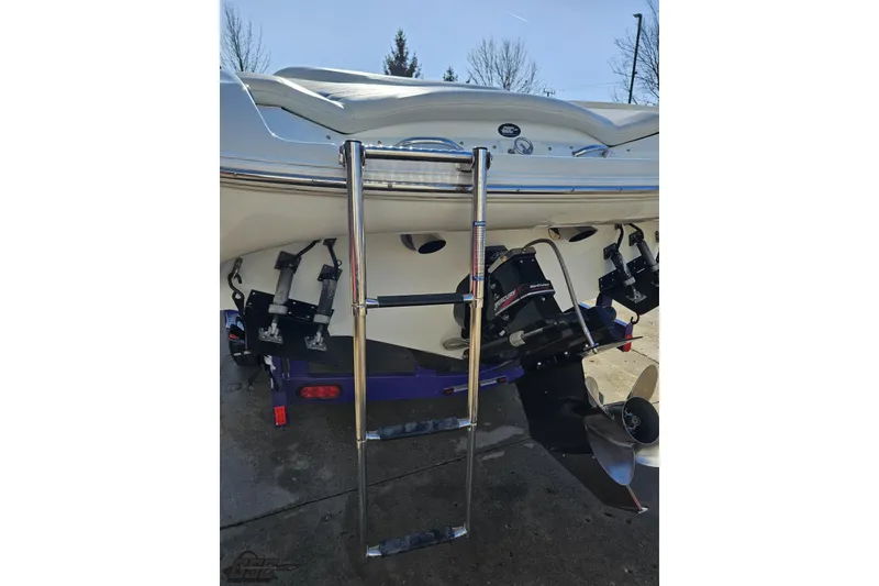 Slide: The Image of 2003 Baja 275 Boss boat rear view with ladder and propeller. - 41