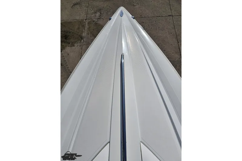Slide: The Image of Bow view of 2003 Baja 275 Boss boat on concrete surface. - 78