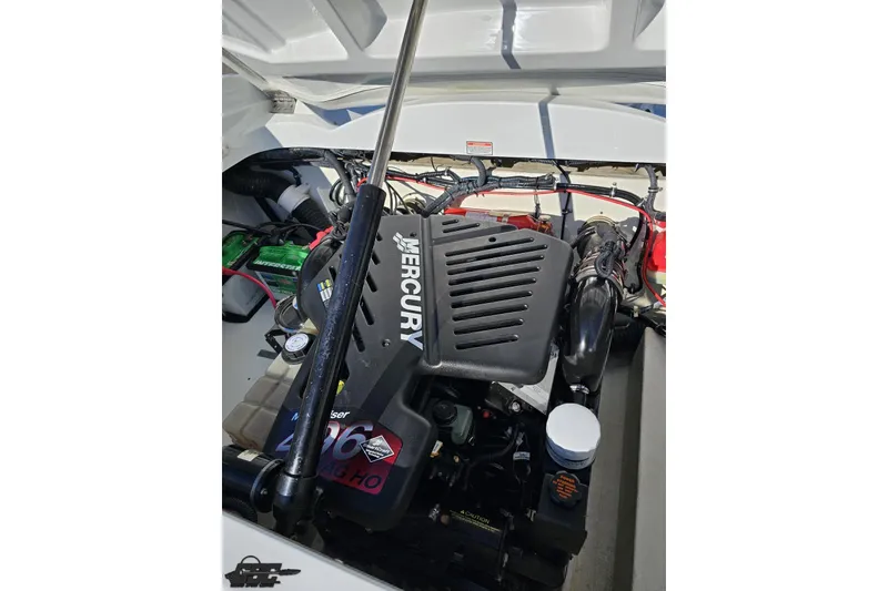 Slide: The Image of 2003 Baja 275 Boss boat engine compartment with Mercury 496 MAG HO engine. - 98