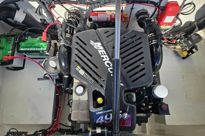 Slide: The Image of Engine compartment of a 2003 Baja 275 Boss with MerCruiser 496 HO engine. - 99