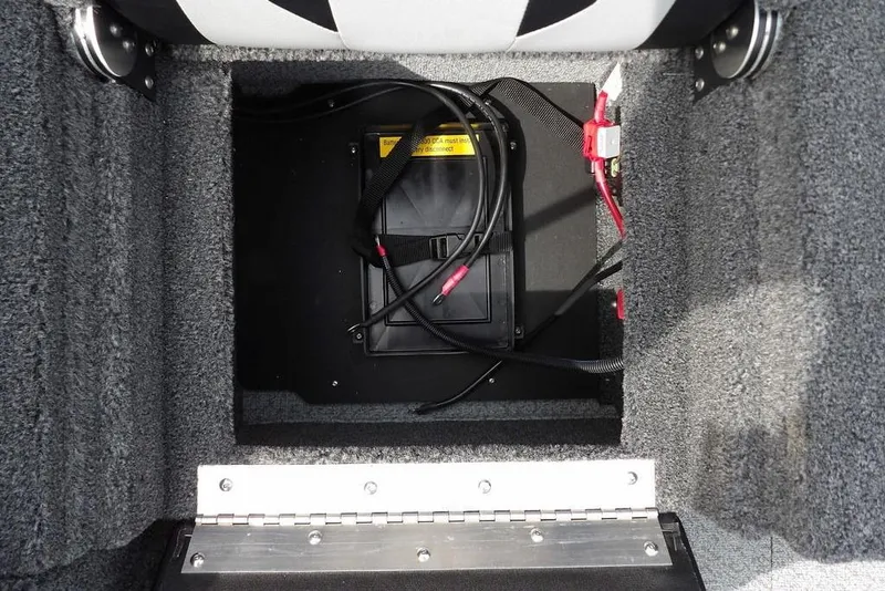 Slide: The Image of Battery compartment of 2025 Crestliner 1850 Fish Hawk Tiller boat, featuring secure wiring. - 12