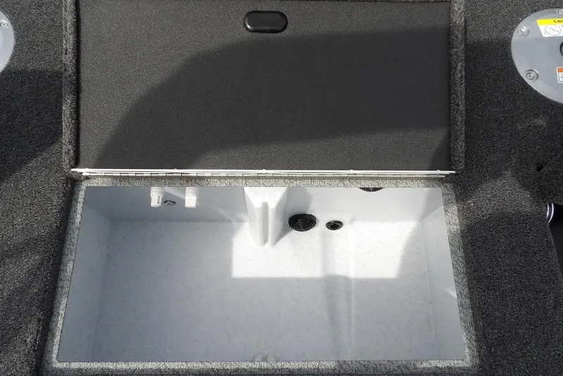 Slide: The Image of Open storage compartment in 2025 Crestliner 1850 Fish Hawk Tiller boat. - 15
