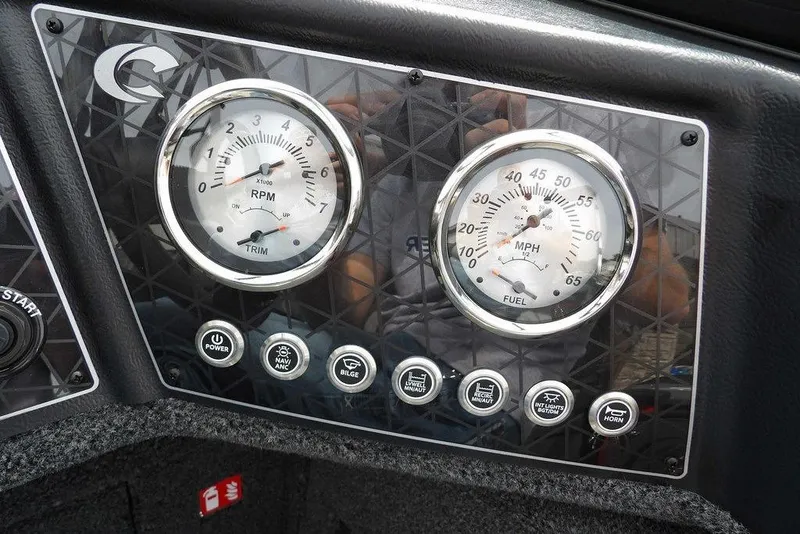 Slide: The Image of Dashboard of 2025 Crestliner 1850 Fish Hawk Tiller with RPM and speed gauges. - 24