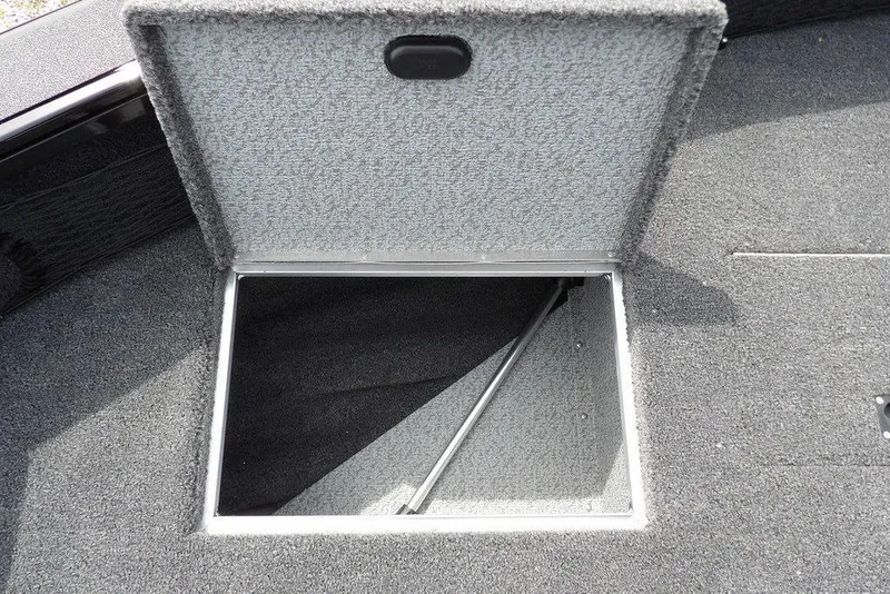 Slide: The Image of Open storage compartment on 2025 Crestliner 1850 Fish Hawk Tiller boat. - 38
