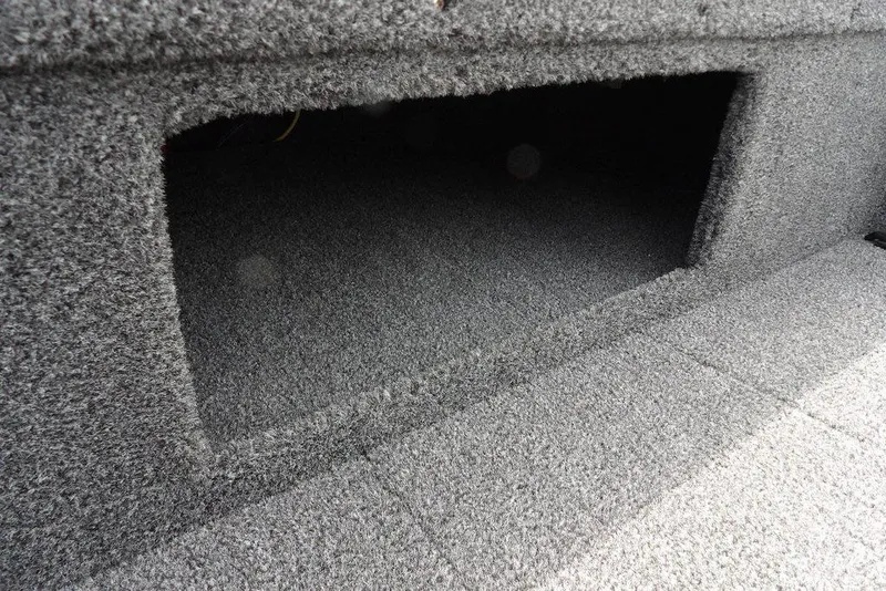 Slide: The Image of Carpeted storage compartment in 2025 Crestliner 1850 Fish Hawk Tiller boat. - 41