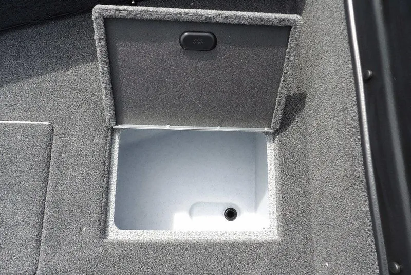 Slide: The Image of Open storage compartment in 2025 Crestliner 1850 Fish Hawk Tiller boat. - 42