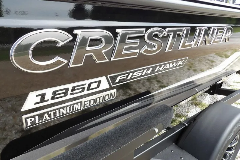 Slide: The Image of 2025 Crestliner 1850 Fish Hawk Tiller, Platinum Edition boat branding detail. - 45