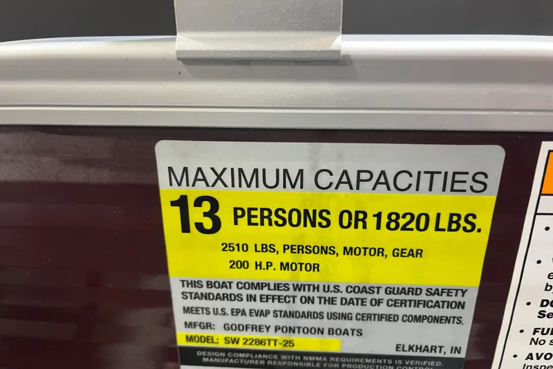 Slide: The Image of Capacity label on 2023 Godfrey Sweetwater 2286 C, max 13 persons or 1820 lbs. - 17