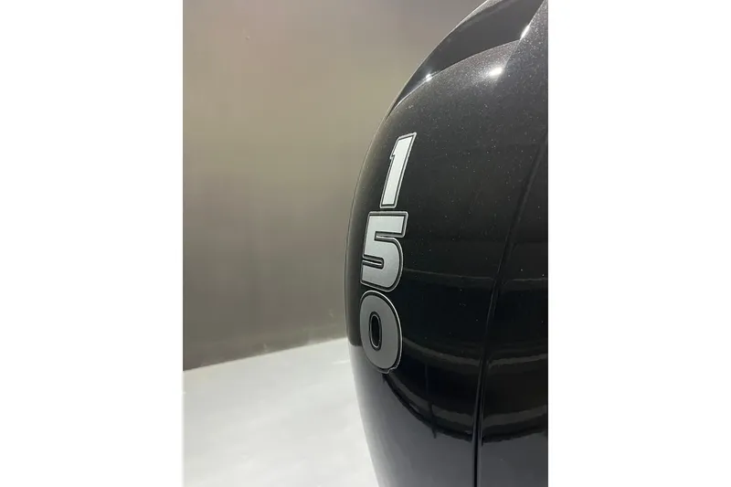 Slide: The Image of Close-up of 150 horsepower engine on 2023 Godfrey Sweetwater 2286 C boat. - 6