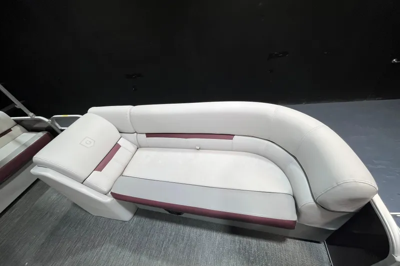Slide: The Image of 2023 Godfrey Sweetwater 2286 C boat seating with elegant white and maroon upholstery. - 9